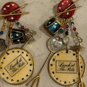 LUNCH AT THE RITZ DRUM EARRINGS MEASURING 4”.